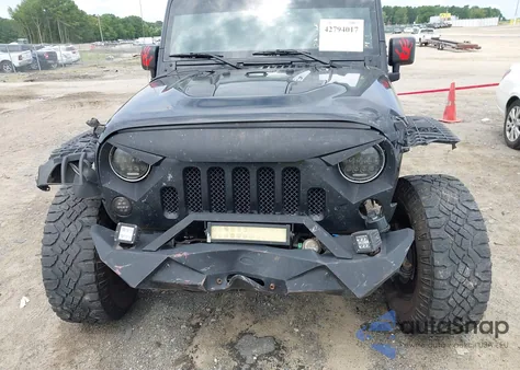 2015 Jeep Wrangler Unlimited Sahara z USA, uszkodzony, nr VIN 1C4BJWEGXFL614267